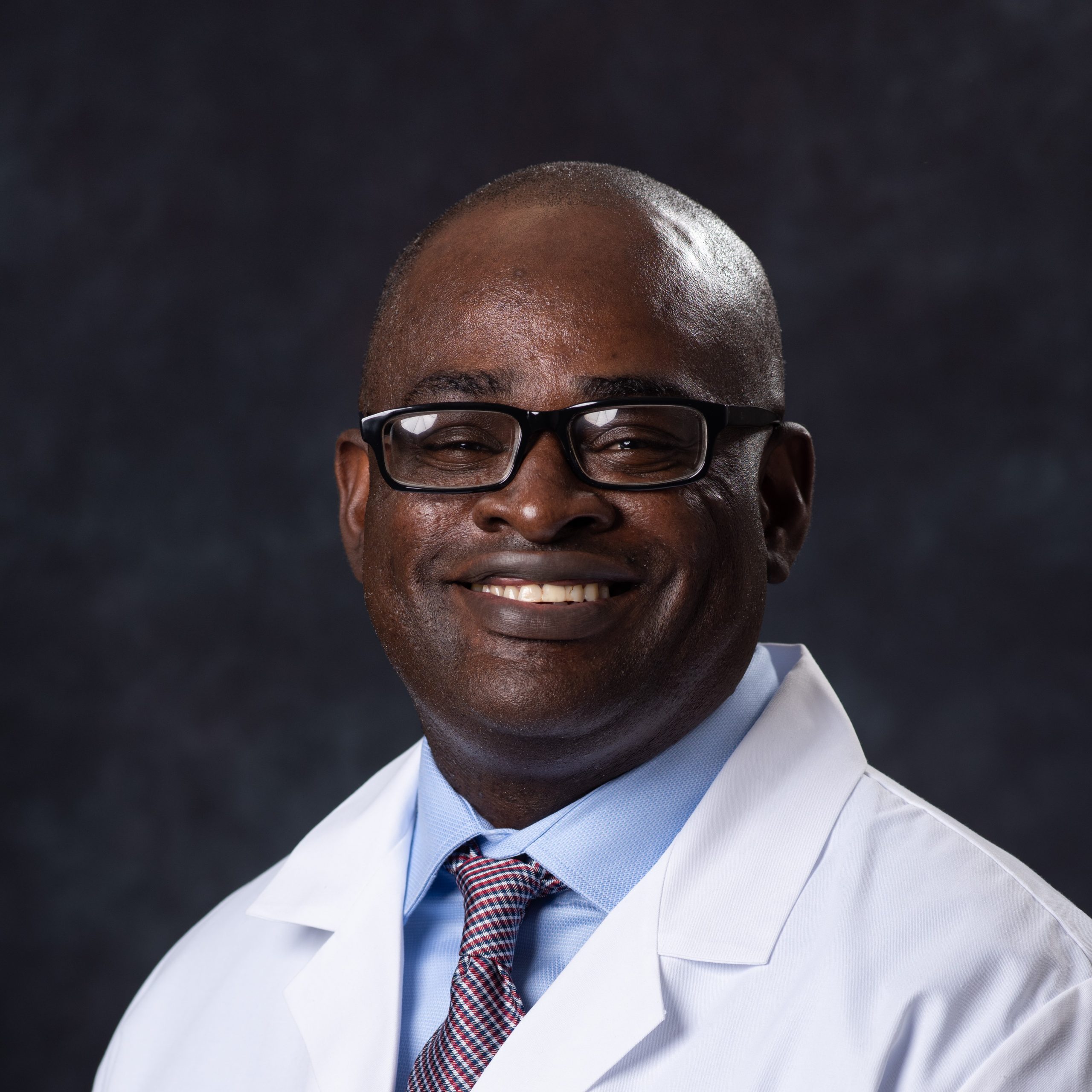 Headshot of Derick Ogude, MD